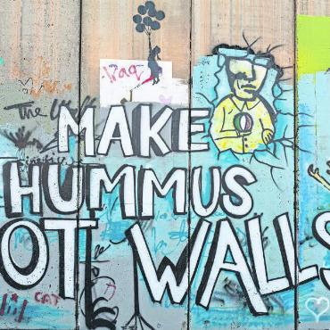 Christentum in Israel/Palästina: palästinensische Theologie im aktuellen Kontext - Graffiti von Bansky an der Mauer von Bethlehem.