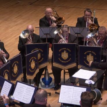 Bach goes Britain: International erfolgreiche Brassband holt Saaner Dirigent