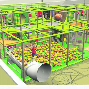 «Station» Saanen – das Feuer brennt noch - Im bisherigen Maschinenraum im Erdgeschoss soll ein Indoorspielplatz entstehen. Das Ziel der Rutschbahn wird sich direkt in einem bunten Bällebad befinden. VISUALISIERUNGEN: HPS PLAY COMPANY GMBH